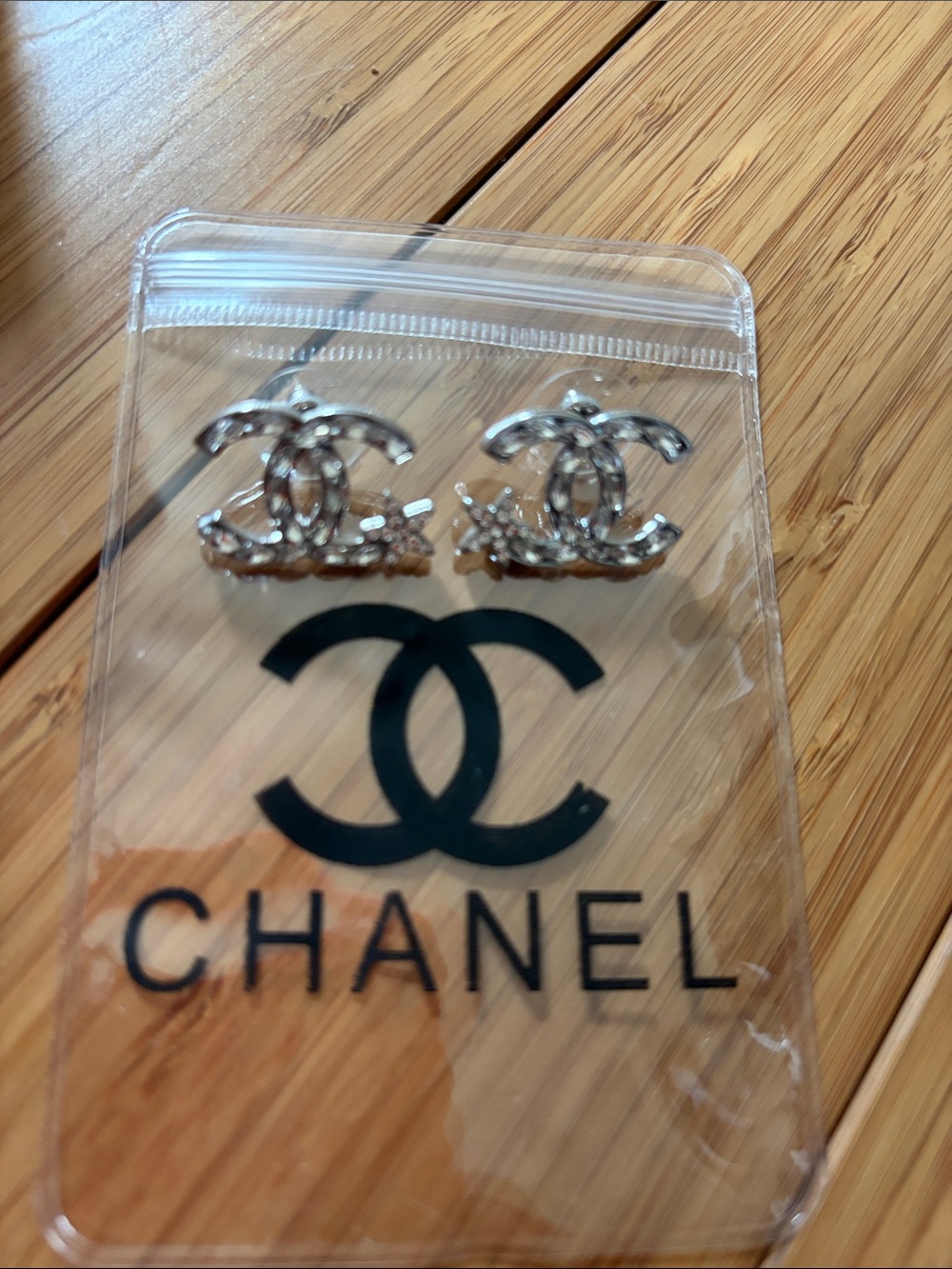 CHANEL Silver Interlocking CC Crystal Stud Earrings